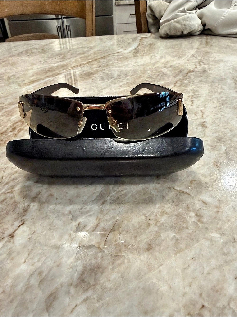 Gucci Tortoiseshell Sunglasses in Brown.